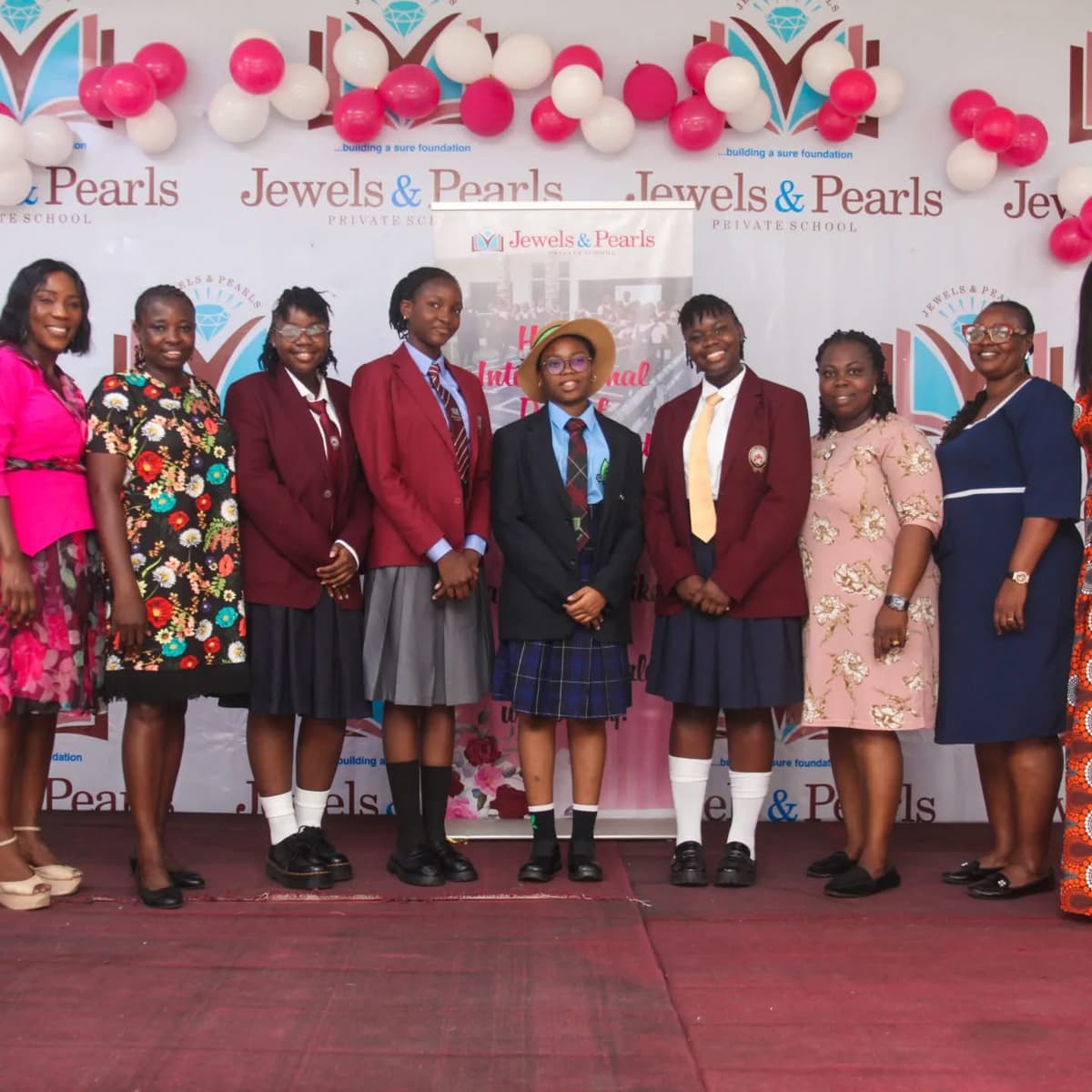 Students and staff at Jewels and Pearls Private School's International Day celebration
